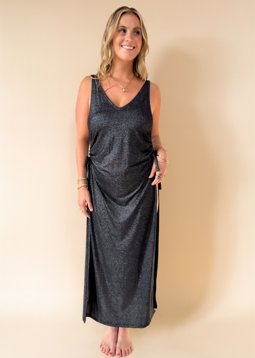 Isola Maxi dress midnight on model in studio font | Model wears size M/L • 5'8" • US8 • 36DD
