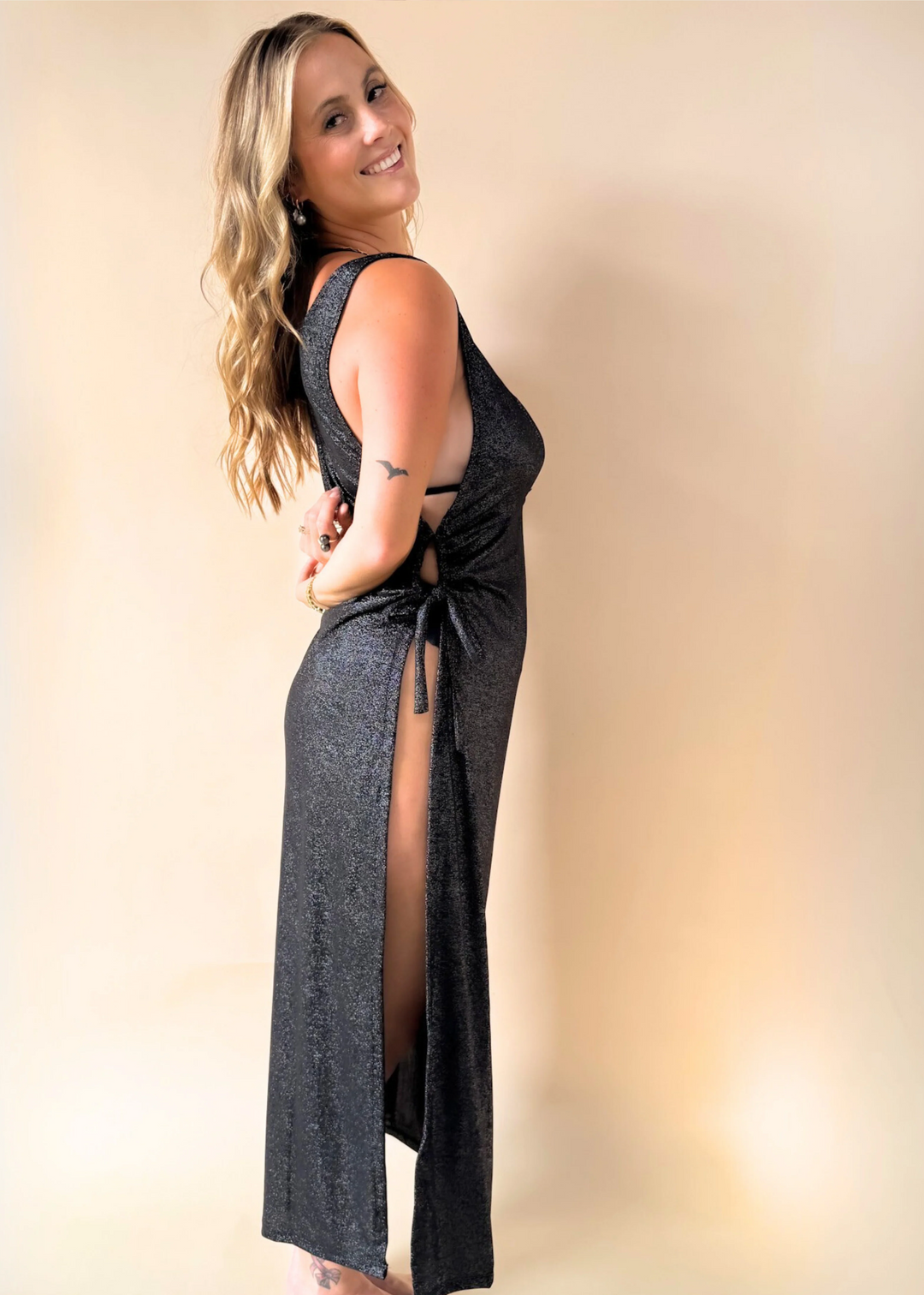 Isola Maxi dress midnight on model in studio side slit | Model wears size M/L • 5'8" • US8 • 36DD